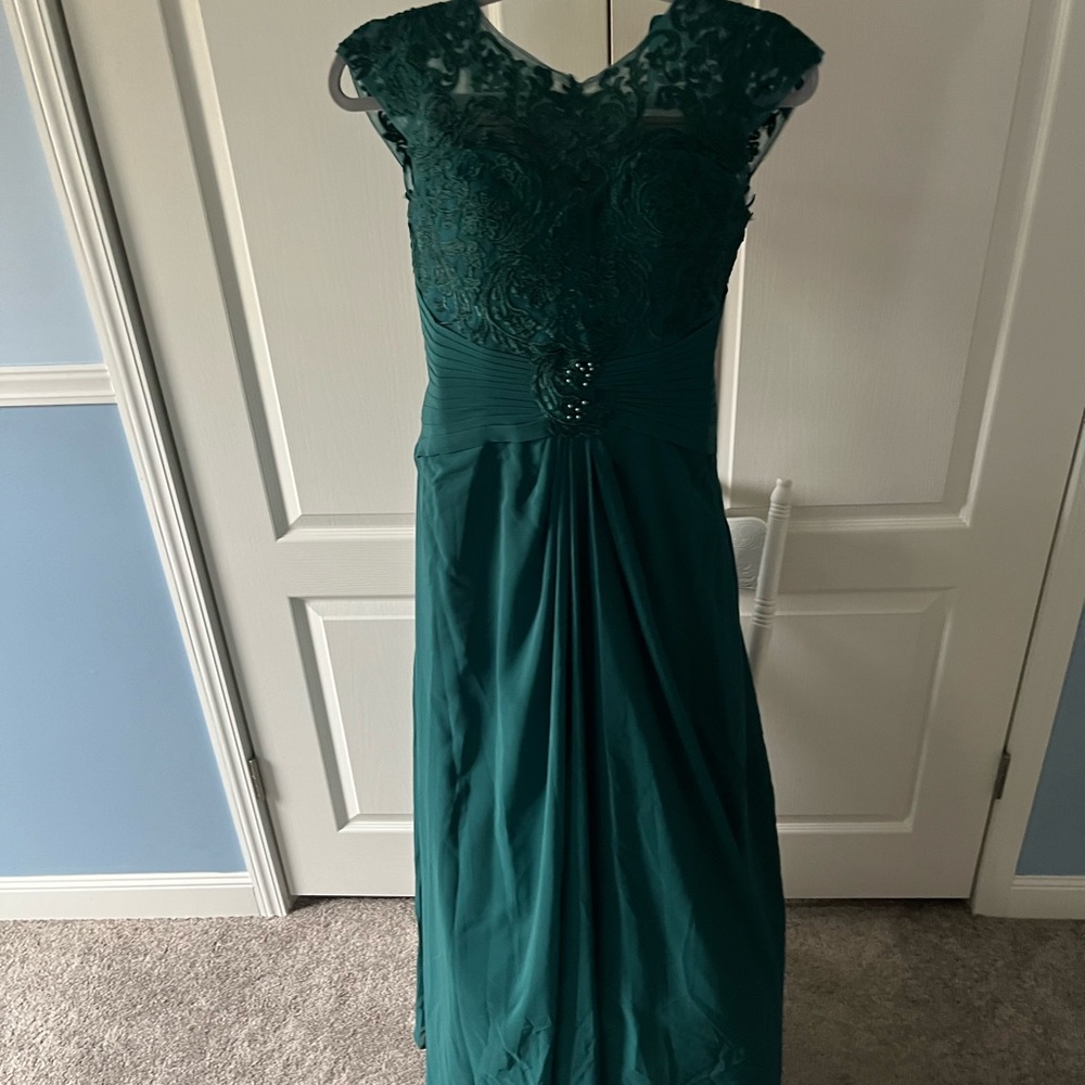 Emerald green gown by Gown Gallery new with tags.
